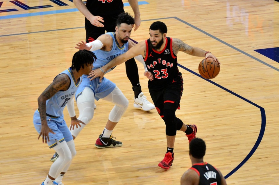 <strong>Toronto Raptors guard Fred VanVleet (23) handles the ball against Memphis Grizzlies guards Dillon Brooks, center, and Ja Morant (12) in the first half of an NBA basketball game Monday, Feb. 8, 2021, at FedExForum.</strong> (Brandon Dill/AP)
