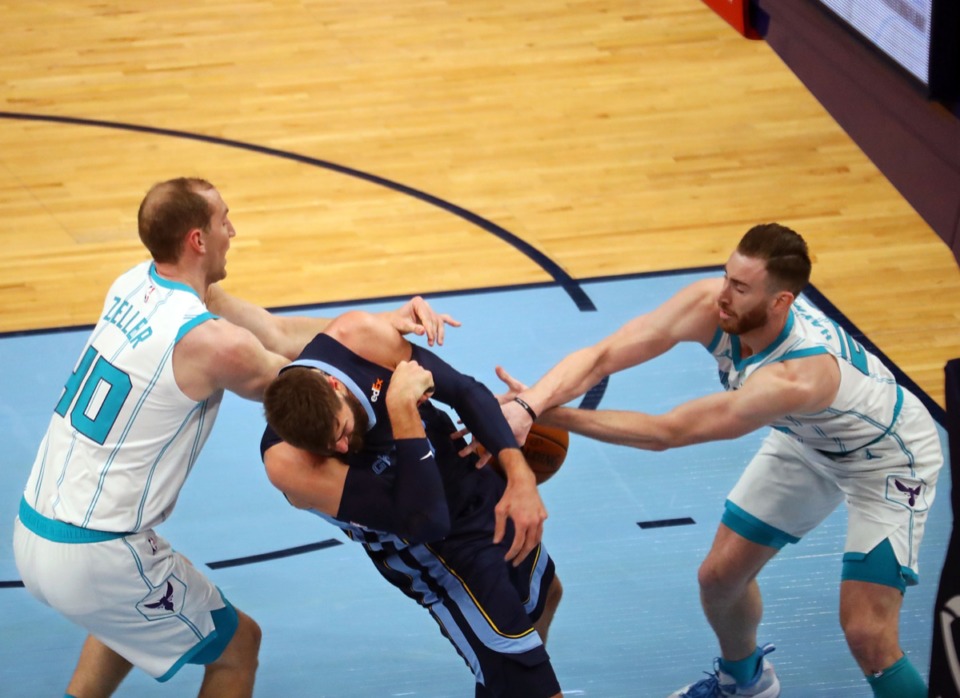 <strong>Memphis Grizzles center Jonas Valanciunas (17) fights for a rebound with Charlotte Hornets forward Gordon Hayward (20) on Feb. 10, 2021 game at FedExForum.</strong> (Patrick Lantrip/Daily Memphian)