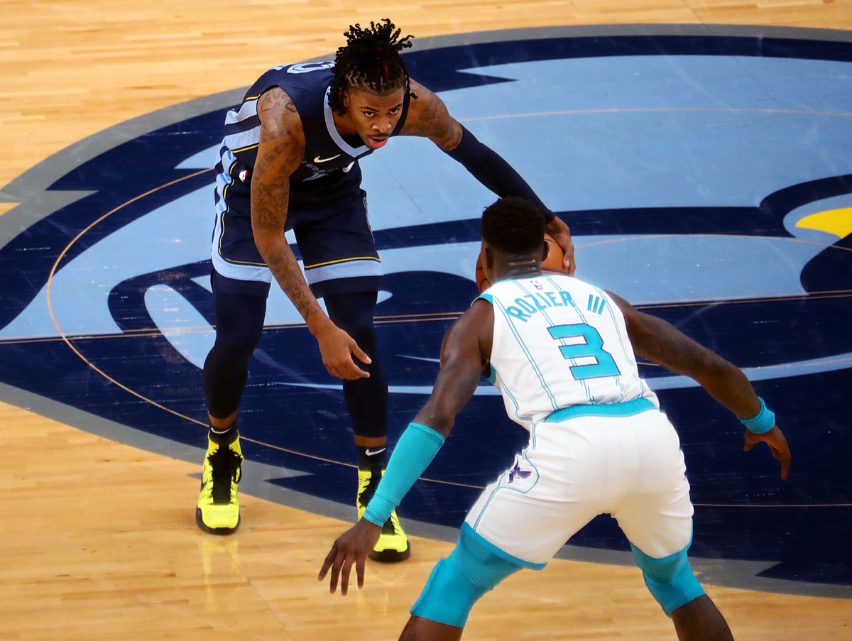 <strong>Memphis Grizzles guard Ja Morant (2) stares down Charlotte Hornets guard Terry Rozier (3) during the Feb. 10 game at FedExForum.</strong> (Patrick Lantrip/Daily Memphian)