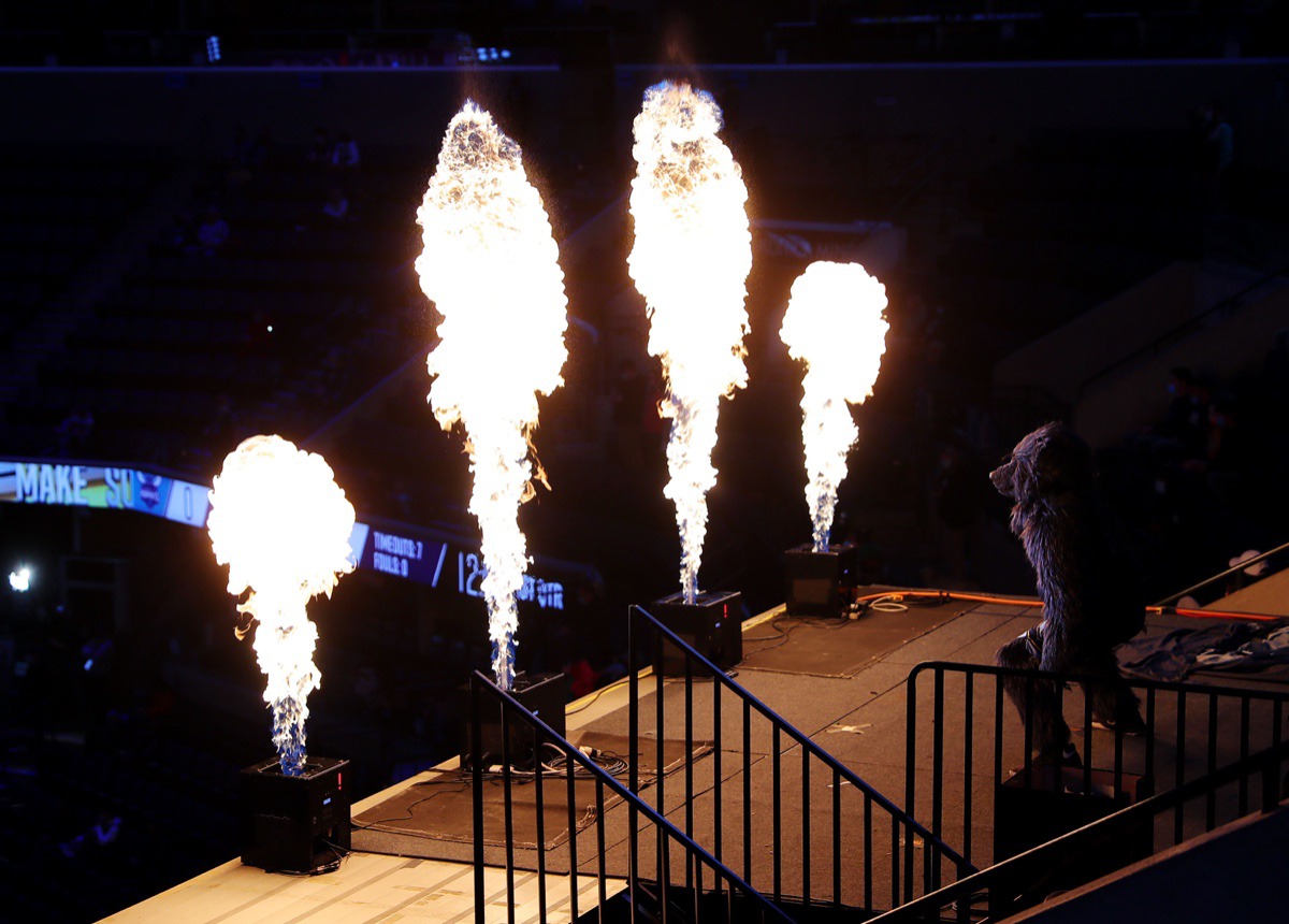 <strong>Grizz, the Memphis Grizzlies mascot, gets the crowd pumped up before the Feb. 10 game against the Charlotte Hornets.</strong> (Patrick Lantrip/Daily Memphian)