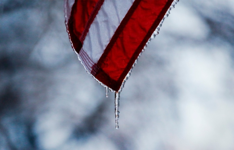 <strong>An icicle dangles from a flag on Thursday, Feb. 11, after freezing rain fell overnight&nbsp;in Memphis and Shelby County.</strong> (Mark Weber/Daily Memphian)