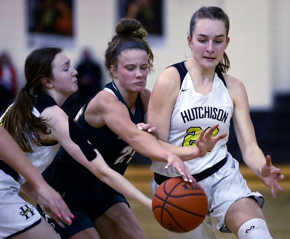 <strong>Briarcrest Christian School's Addie Moore (25) fights for the ball against Hutchison High School's Maxine Engel (20) during the Feb. 12, 2021, game.</strong> (Patrick Lantrip/Daily Memphian)