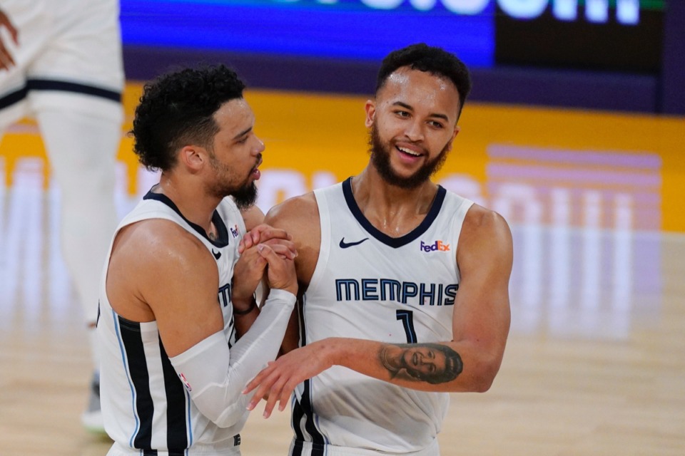 <strong>Grizzlies guard Dillon Brooks, left, and forward Kyle Anderson congratulate each other during a timeout Feb. 12, 2021, against the Lakers in Los Angeles.</strong> (Mark J. Terrill/AP)