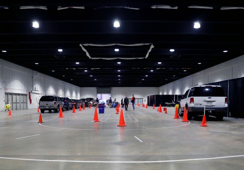 <strong>Three Shelby County Health Departmnt vaccination sites including the Pipkin Building, where (in a Feb. 2 photo) cars travel the line, will be open Saturday, Feb. 13.</strong> (Patrick Lantrip/Daily Memphian)