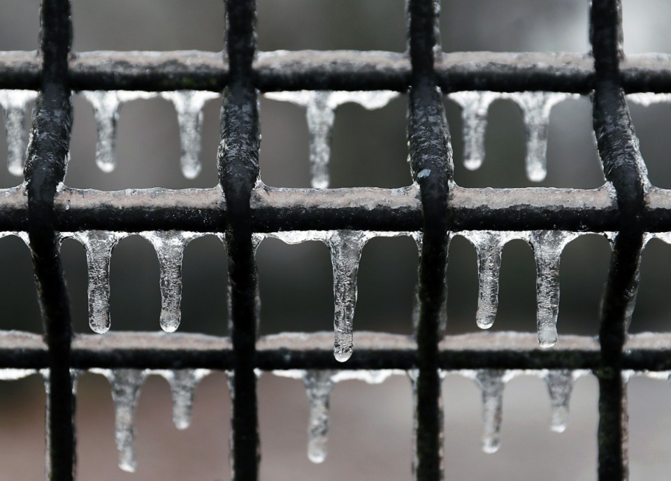 <strong>Icicles form of the fence of an empty Overton Bark dog park Feb. 11, 2021.</strong> (Patrick Lantrip/Daily Memphian)
