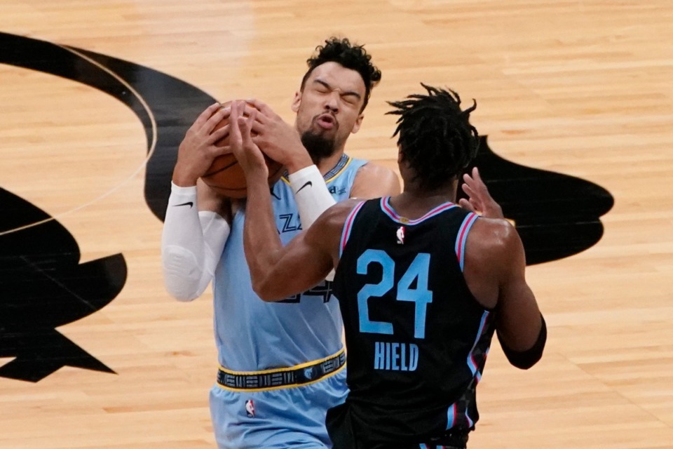 <strong>Memphis Grizzlies guard Dillon Brooks, left, intercepts a pass intended for Sacramento Kings guard Buddy Hield during the NBA basketball game in Sacramento, Calif., Sunday, Feb. 14, 2021. The Grizzlies won 124-110.</strong> (Rich Pedroncelli/AP)