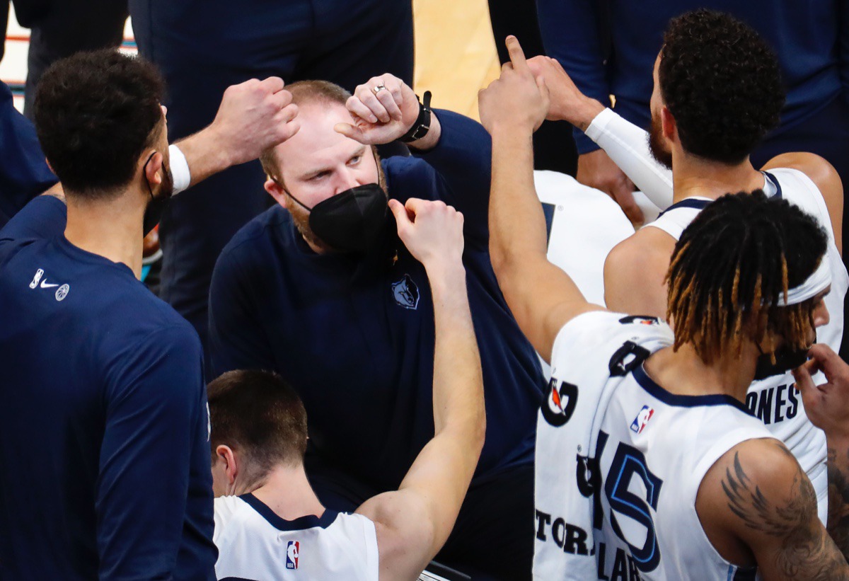 <strong>Grizzlies head coach Tyler Jenkins (middle) talks to his team during the game against the Detroit Pistons on Friday, Feb. 19, 2021.</strong> (Mark Weber/The Daily Memphian)
