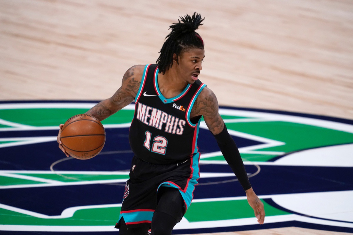 <strong>Grizzlies guard Ja Morant (12) handles the ball in the game against the Dallas Mavericks in Dallas, Monday, Feb. 22, 2021.</strong> (Tony Gutierrez/AP)