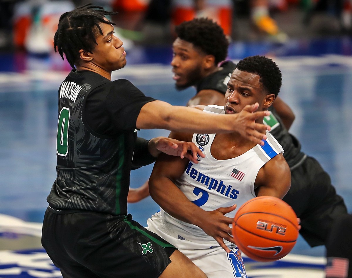 <strong>University of Memphis guard Alex Lomax (2) fights through a Tulane double team during on Feb. 24, 2021.</strong> (Patrick Lantrip/Daily Memphian)