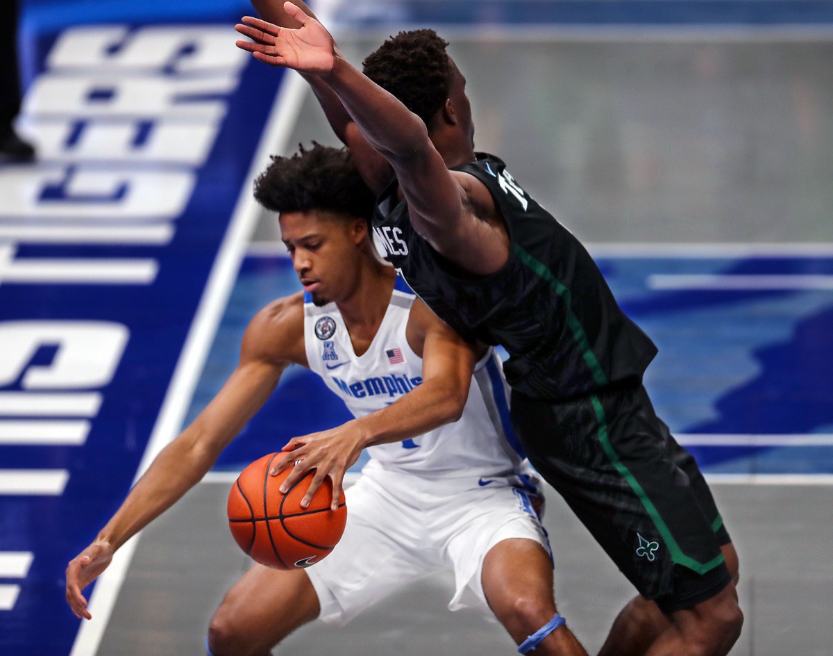 <strong>University of Memphis guard Jayden Hardaway (1) dribbles around a defender during the Feb. 24 game against Tulane.</strong> (Patrick Lantrip/Daily Memphian)
