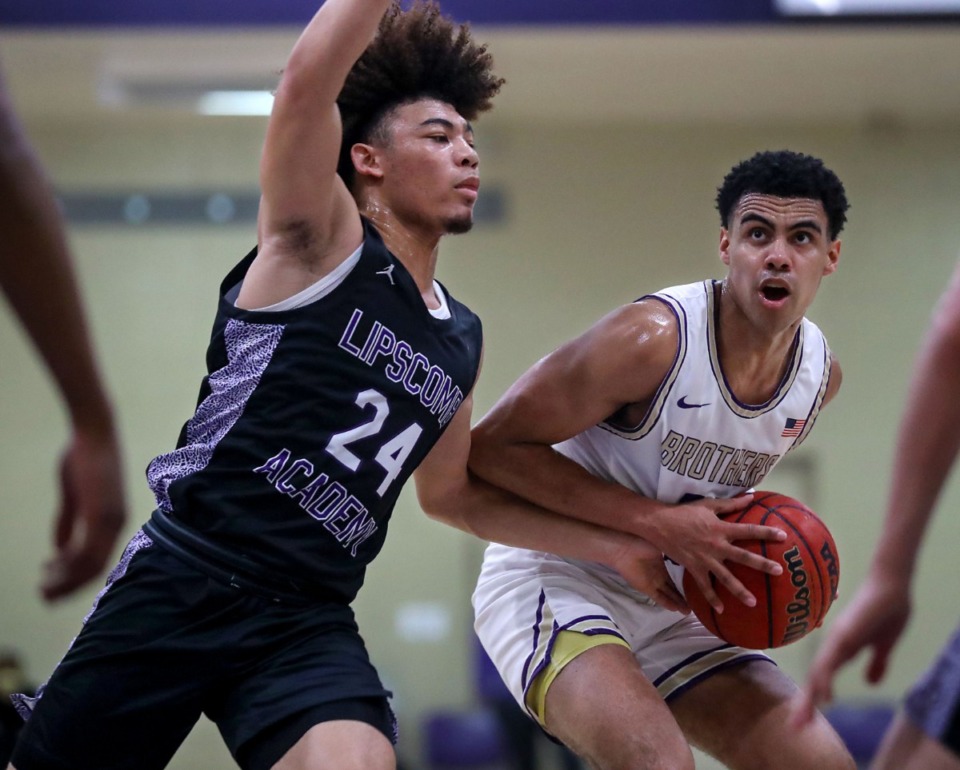 <strong>CBHS guard Reece McMullen (11) looks for an open teammate during a Feb. 27, 2021 game in Memphis against Lipscomb Academy.</strong> (Patrick Lantrip/Daily Memphian)