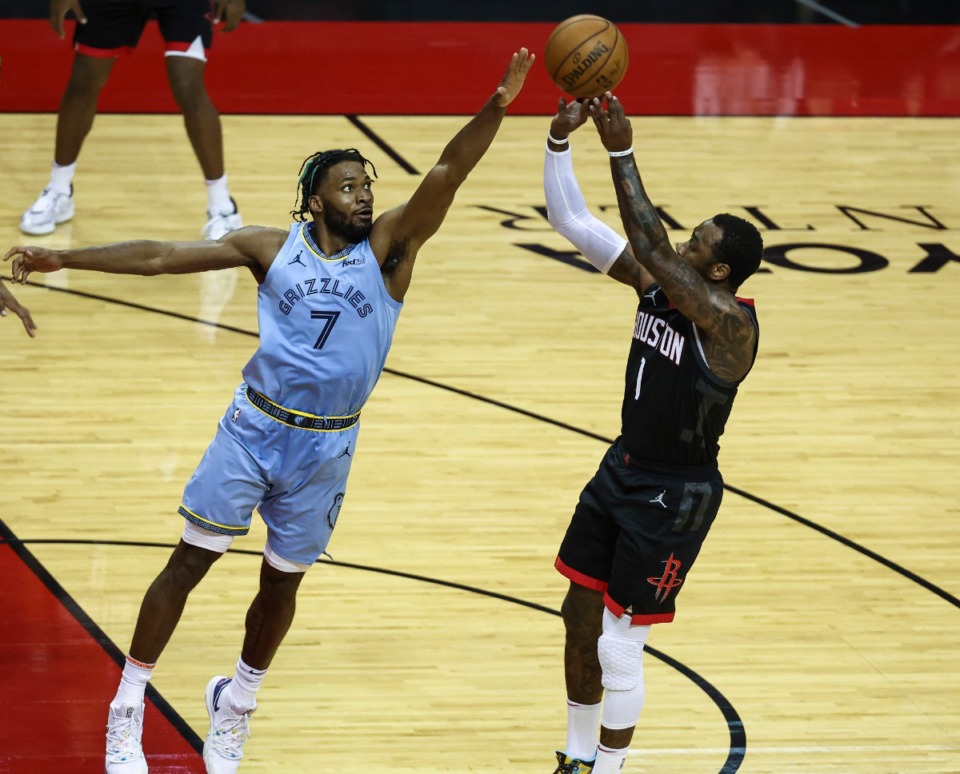 <strong>Houston Rockets guard John Wall (1) shoots as Memphis Grizzlies forward Justise Winslow (7) defends during the first quarter of an NBA basketball game Sunday, Feb. 28, 2021, in Houston.</strong> (Troy Taormina/AP)
