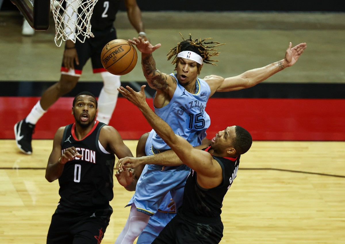 <strong>Memphis Grizzlies forward Brandon Clarke (15) defends against a shot by Houston Rockets guard Eric Gordon (10) during the first quarter of an NBA basketball game Sunday, Feb. 28, 2021, in Houston.</strong> (Troy Taormina/AP)