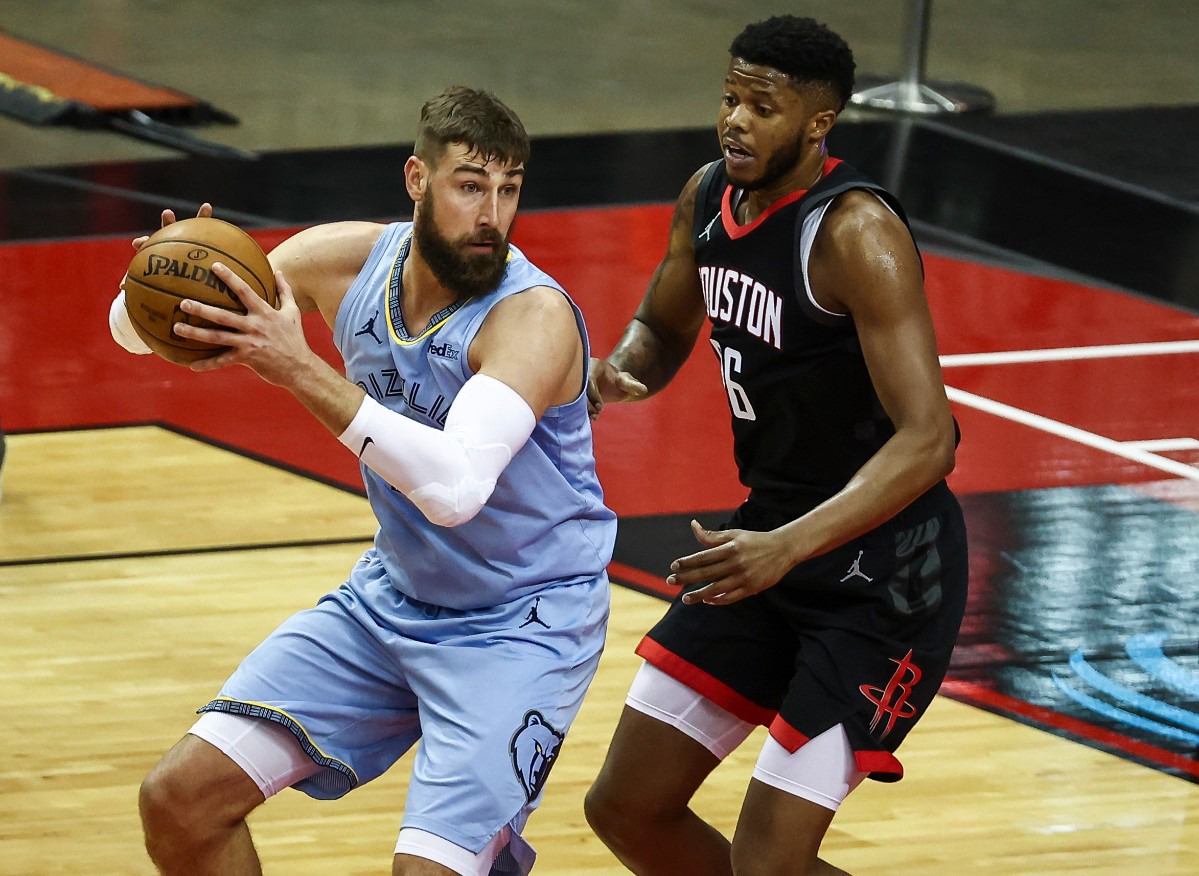<strong>Memphis Grizzlies center Jonas Valanciunas (17) controls the ball as Houston Rockets center Justin Patton (26) defends during the first quarter of an NBA basketball game in Houston, Sunday, Feb. 28, 2021.</strong> (Troy Taormina/AP)