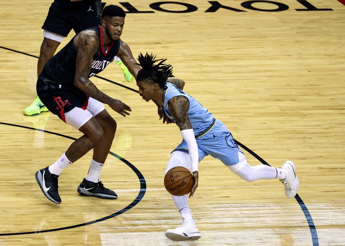 <strong>Memphis Grizzlies guard Ja Morant, right, dribbles against the Houston Rockets during the third quarter of an NBA basketball game Sunday, Feb. 28, 2021, in Houston.</strong> (Troy Taormina/AP)