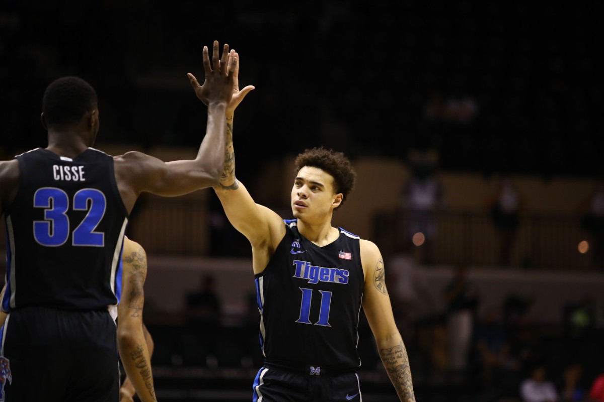 <strong>Memphis Tiger Lester Quinones high-fives Moussa Cisse in the game against USF on March 2, 2021.</strong> (Courtesy University of Memphis)