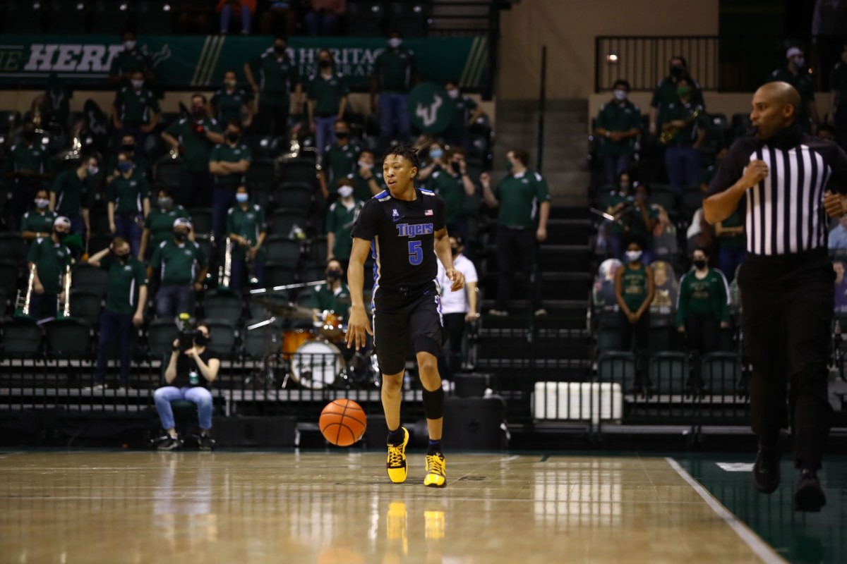 <strong>Memphis Tiger Boogie Ellis looks for the open man in the game against USF on March 2, 2021.</strong> (Courtesy University of Memphis)