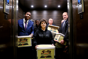 <strong>Holly Carter (center), a retired fire investigator, joins her colleagues as they take an elevator to the basement of City Hall to drop off a petition for a half-cent sales tax increase to restore benefits for police officers and firefighters while also funding road repairs and prekindergarten programs.</strong> (Houston Cofield/Daily Memphian)