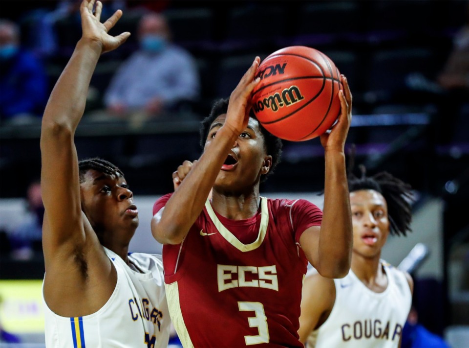<strong>ECS guard Kameron Jones (right) drives to the basket against Goodpasture Christian defender Xavier Shegog (left) during the Division II Class A semifinals game on Thursday, March 4, 2021, in Cookeville.</strong> (Mark Weber/The Daily Memphian)