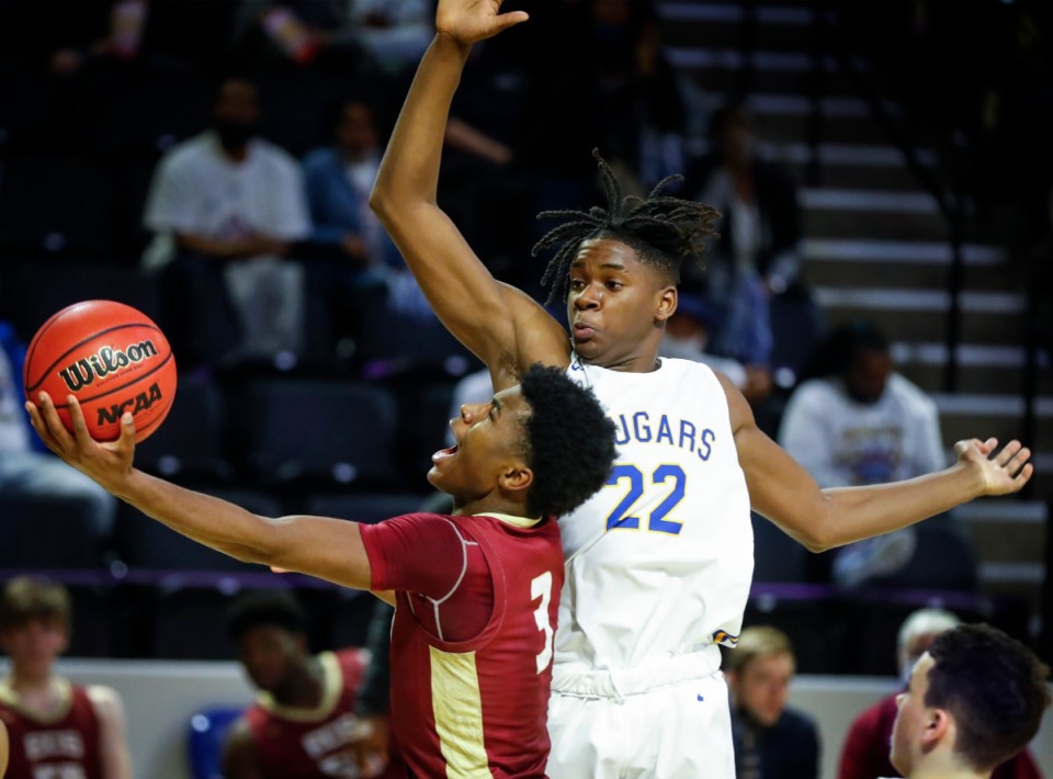 <strong>ECS guard Kameron Jones (left) drives for a layup against Goodpasture Christian defender Xavier Shegog (right) during the Division II Class A semifinals game on Thursday, March 4, 2021, in Cookeville.</strong> (Mark Weber/The Daily Memphian)
