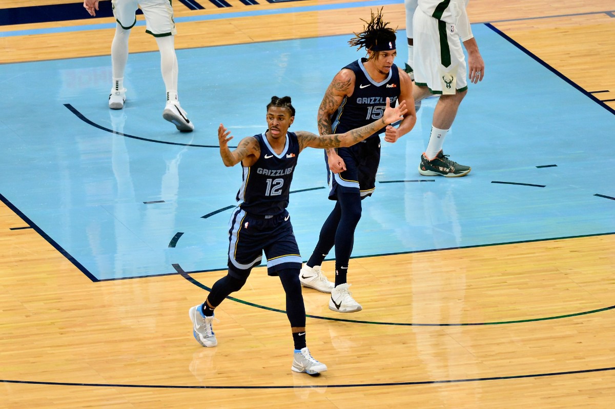 <strong>Memphis Grizzlies guard Ja Morant (12) signals to his team during the against Milwaukee&nbsp;on March 4 at FedExForum. (Brandon Dill/AP)</strong>