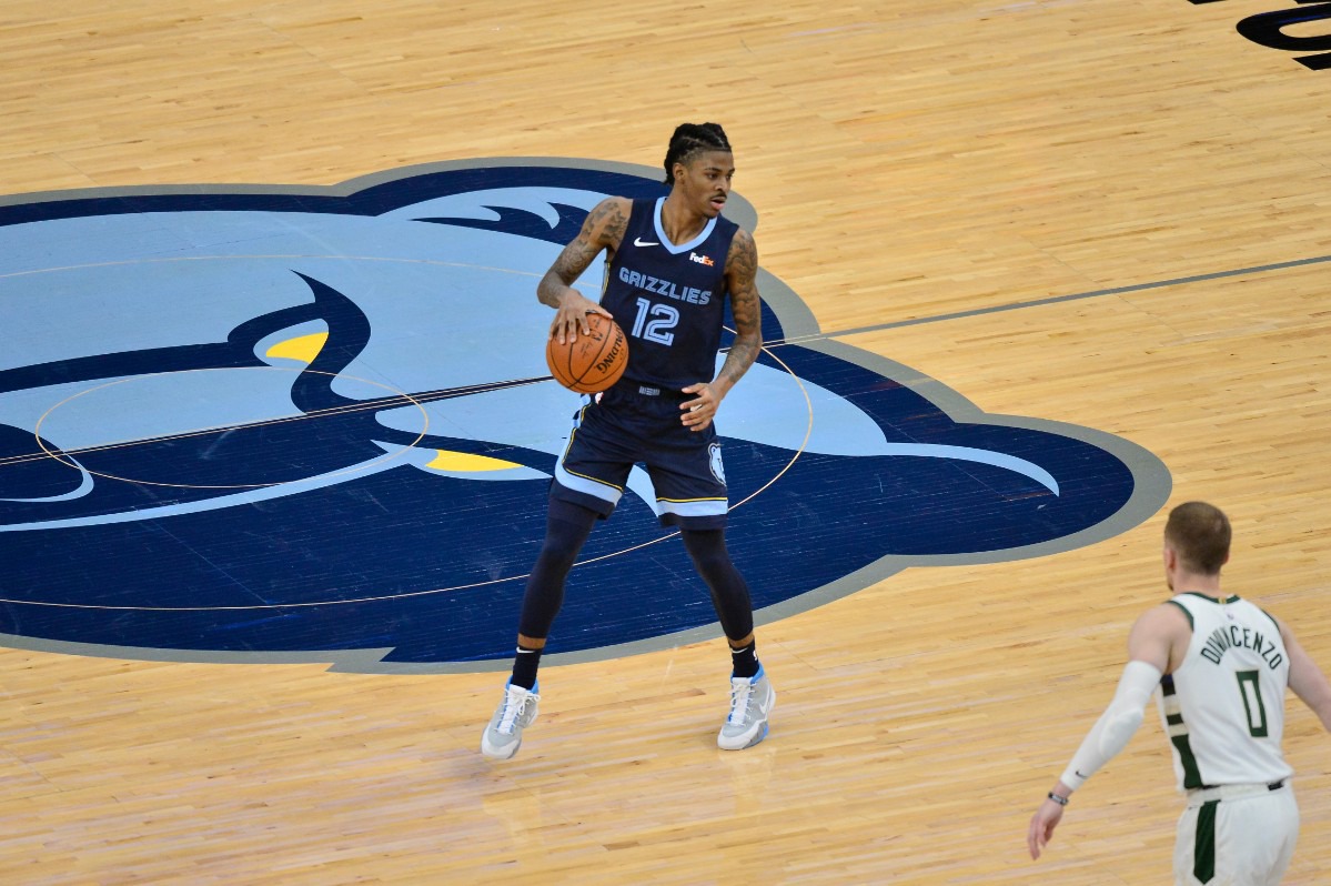 <strong>Memphis Grizzlies guard Ja Morant (12) calls a play against the Milwaukee Bucks&nbsp;on March 4 at FedExForum.</strong> (Brandon Dill/AP)