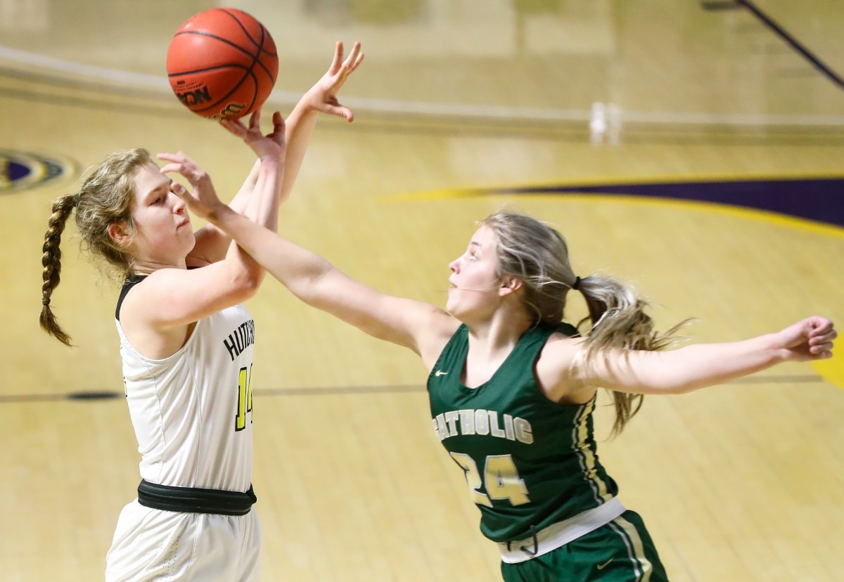 <strong>Hutchison guard Maddie Prather (left) puts up a 3-point shot against Knoxville Catholic defender Sydney Mains (right) during action of the Division II Class AA finals game on Saturday, March 6, 2021 in Cookeville.</strong> (Mark Weber/The Daily Memphian)