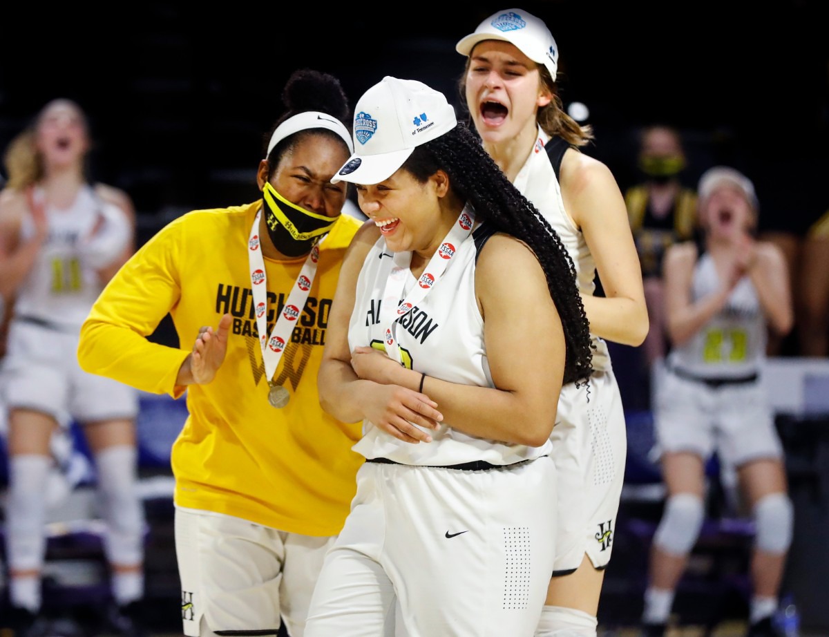 <strong>Hutchison senior Kaia Barnett (middle) celebrates with teammates Carmyn Harrison (left) and Maxine Engel (right) after being named Division II Class AA finals game MVP on Saturday, March 6, 2021 in Cookeville.</strong> (Mark Weber/The Daily Memphian)