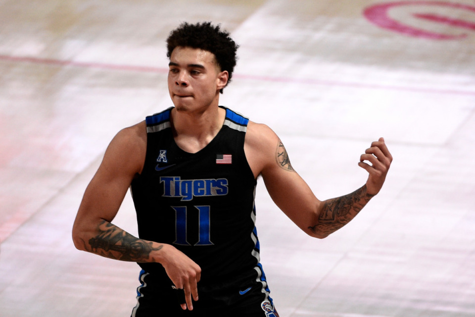 <strong>Memphis guard Lester Quinones reacts after making a three point basket during the first half of an NCAA college basketball game against Houston, Sunday, March 7, 2021, in Houston.</strong> (Eric Christian Smith/AP)