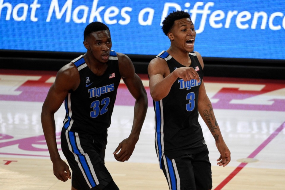 <strong>Memphis guard Landers Nolley II (3) reacts after making a three point basket as Moussa Cisse (32) watches during the first half of an NCAA college basketball game against Houston, Sunday, March 7, 2021, in Houston.</strong> (Eric Christian Smith/AP)