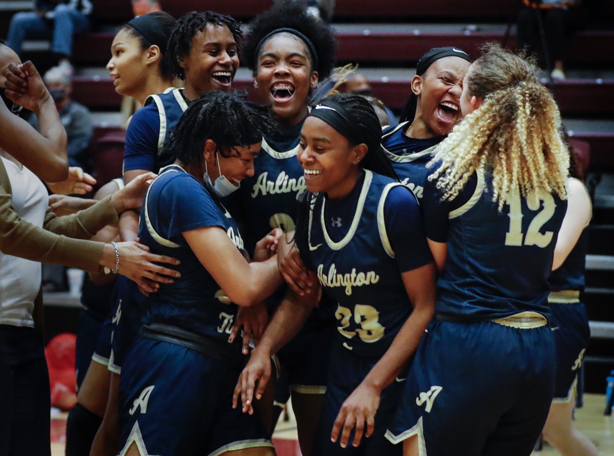 <strong>Arlington teammates celebrate a 47-43 victory over Collierville on Monday, March 8, 2021.</strong> (Mark Weber/The Daily Memphian)