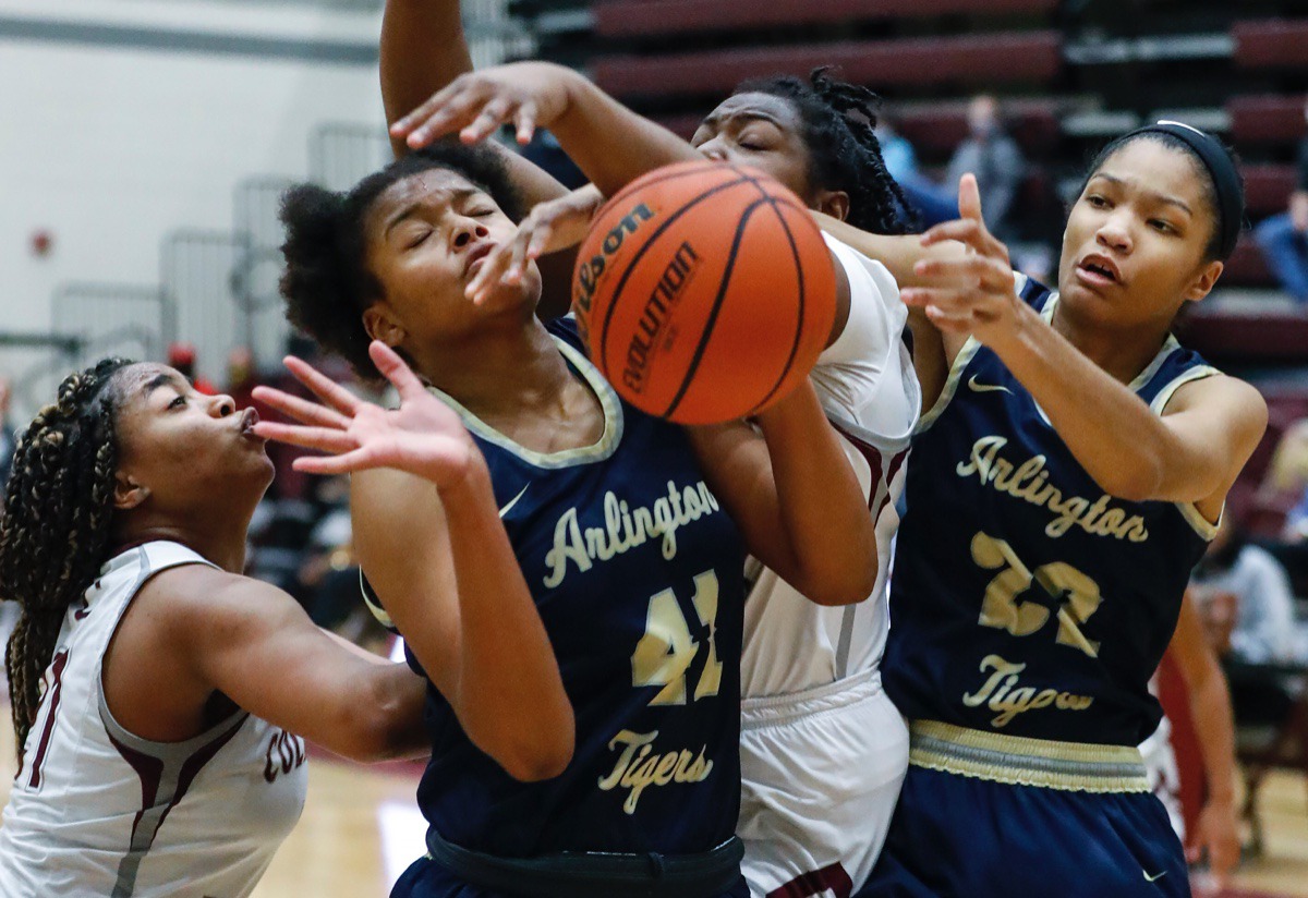 <strong>Arlington&rsquo;s Keanna Coburn (second (left) and Taylor Dupree (right) battle Collierville&rsquo;s Mannie Amaefula (left) and Jordan Harris (middle) for a rebound on Monday, March 8, 2021.</strong> (Mark Weber/The Daily Memphian)