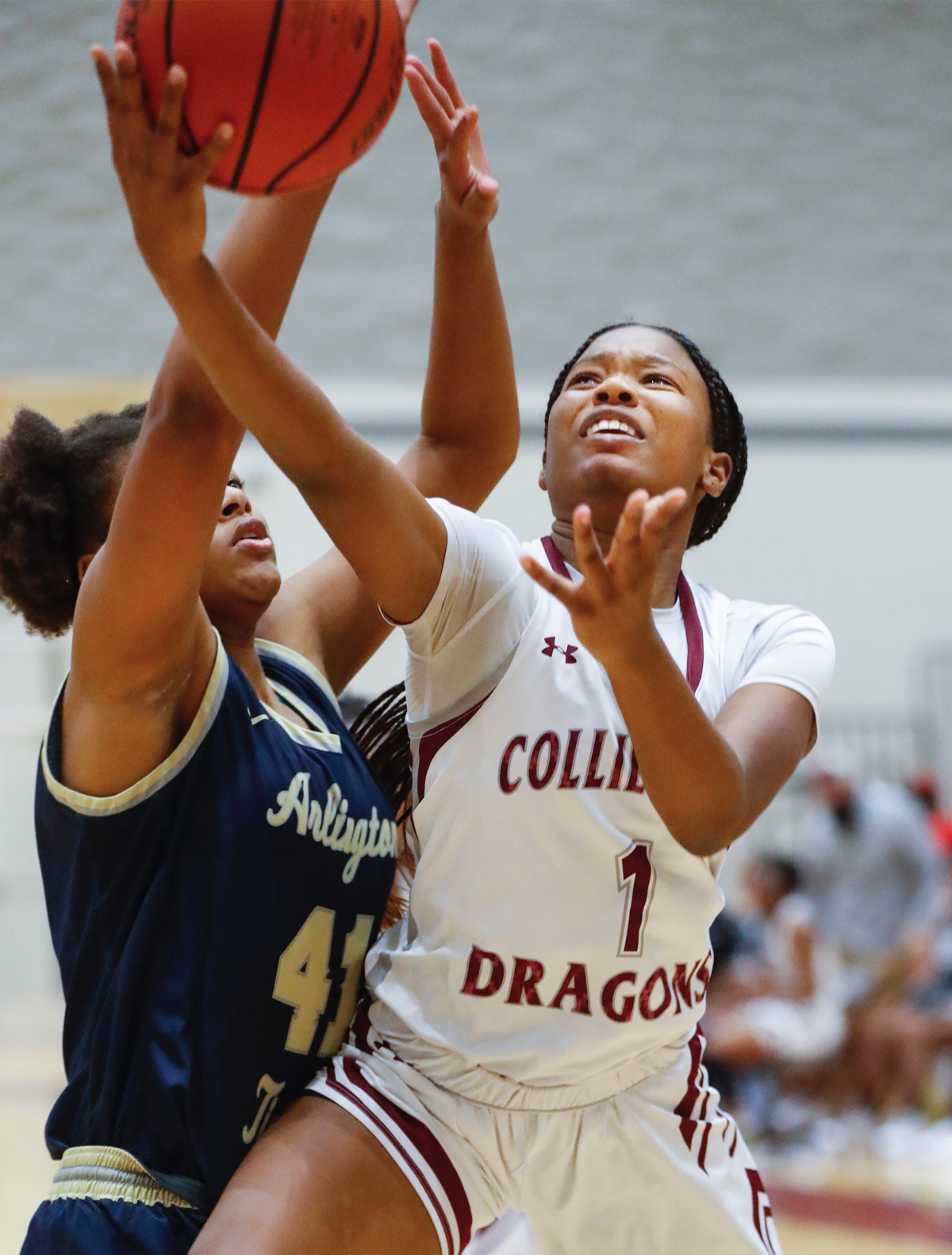 <strong>Collierville guard Mallory Taylor (right) drives the lane against Arlington defender Keanna Coburn (left) on Monday, March 8, 2021.</strong> (Mark Weber/The Daily Memphian)