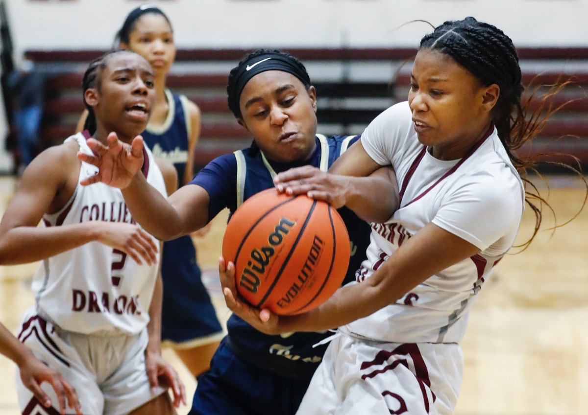 <strong>Collierville guard Mallory Taylor (right) battles Arlington&rsquo;s Carmen Taylor (left) on Monday, March 8, 2021.</strong> (Mark Weber/The Daily Memphian)