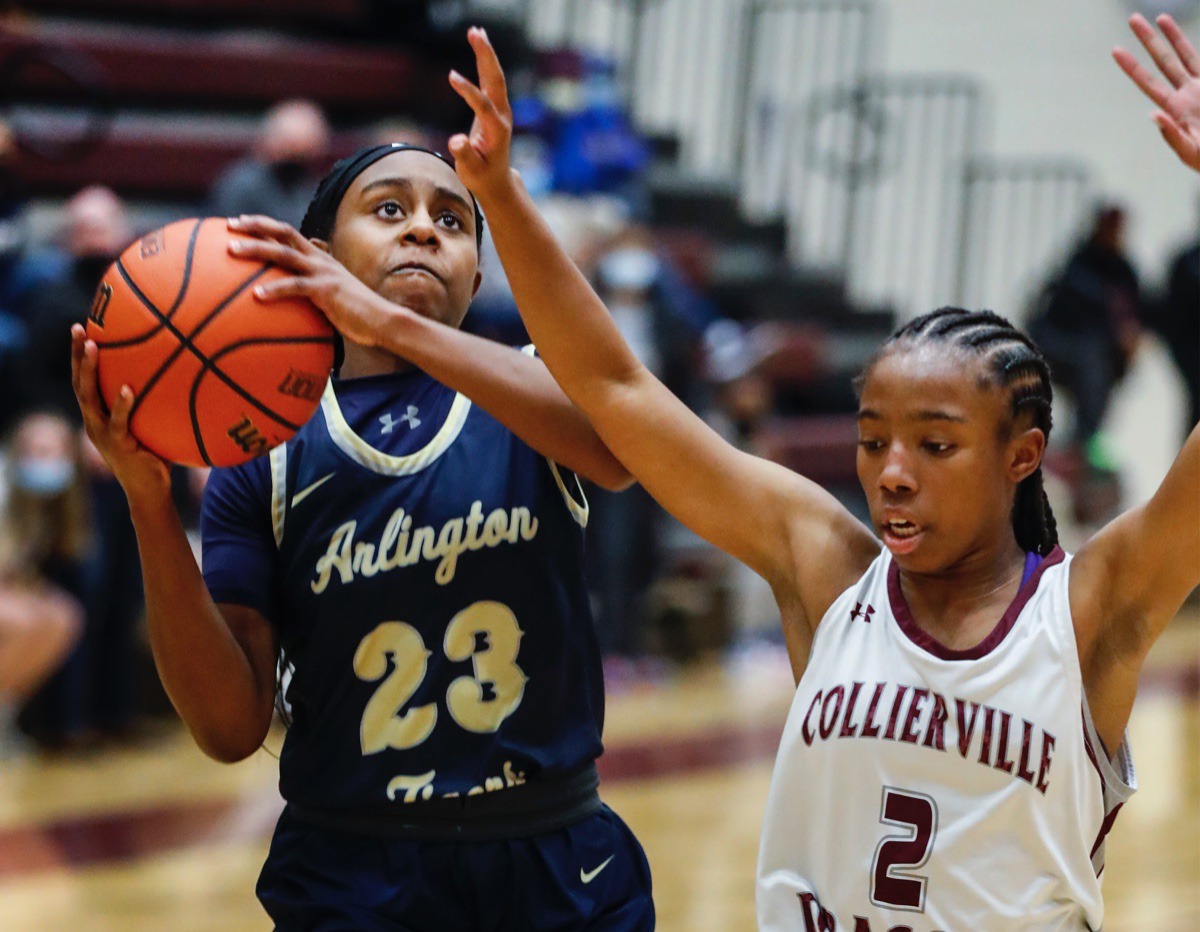 <strong>Arlington guard Carmen Taylor (left) drives the lane against Collierville&rsquo;s Nakiyah Westbrook (right) on Monday, March 8, 2021.</strong> (Mark Weber/The Daily Memphian)