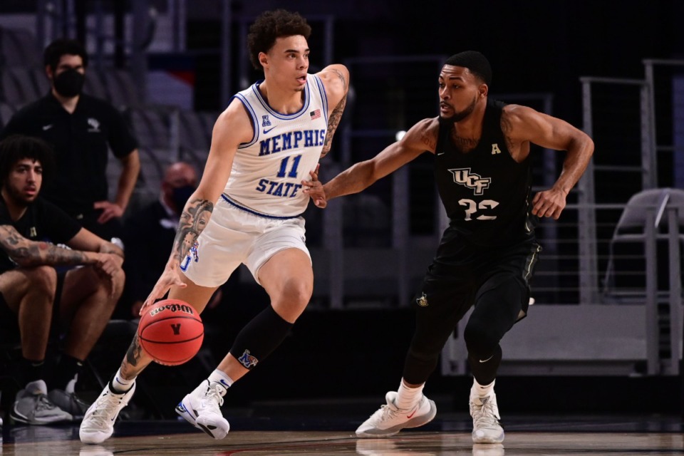 <strong>U of M&rsquo;s Lester Quinones (11) drives against the University of Central Florida on March 12, 2021.</strong> (Courtesy American Athletic Conference/Ben Solomon)