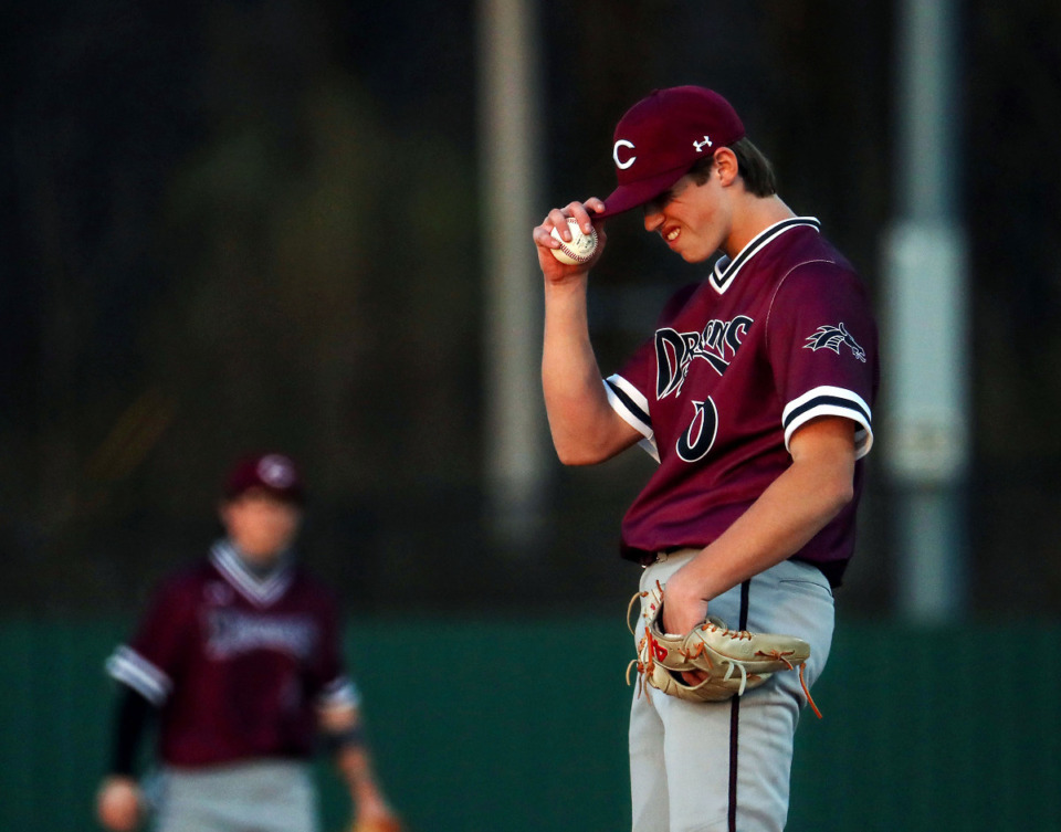 <strong>Collierville pitcher Grayson Saunier (10) reacts after a hit during a March 15, 2021 game against Briarcrest.</strong> (Patrick Lantrip/Daily Memphian)