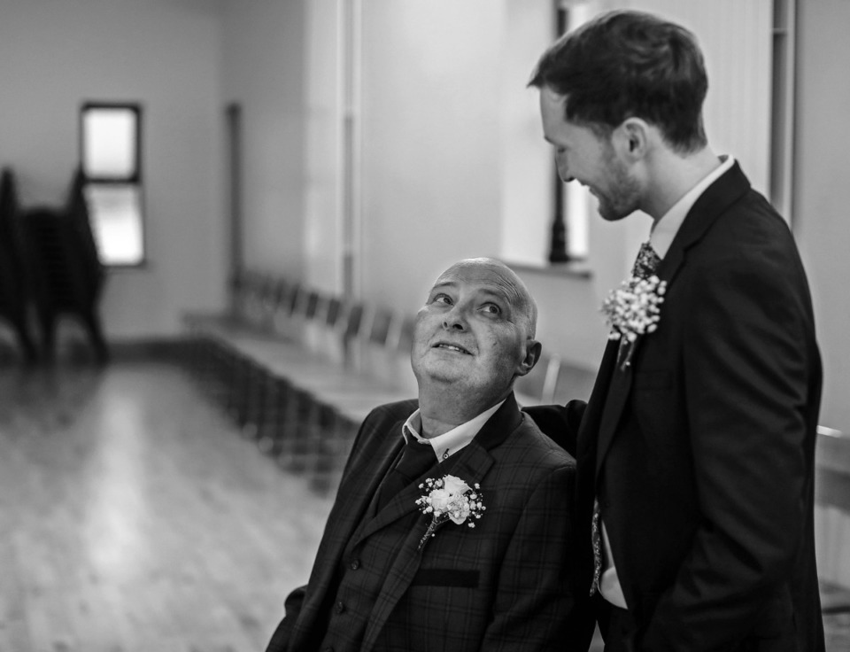 <strong>Martin Nilan shares a moment with his son Ciar&aacute;n Nilan after his wedding March 21, 2020.</strong> (Patrick Lantrip/Daily Memphian)