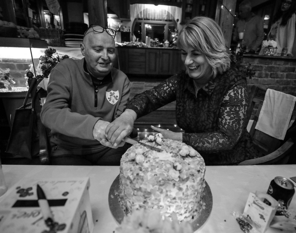 <strong>Martin Nilan and Christina Scheunemann Nilan cut their wedding cake after their wedding March 21, 2020.</strong> (Patrick Lantrip/Daily Memphian)