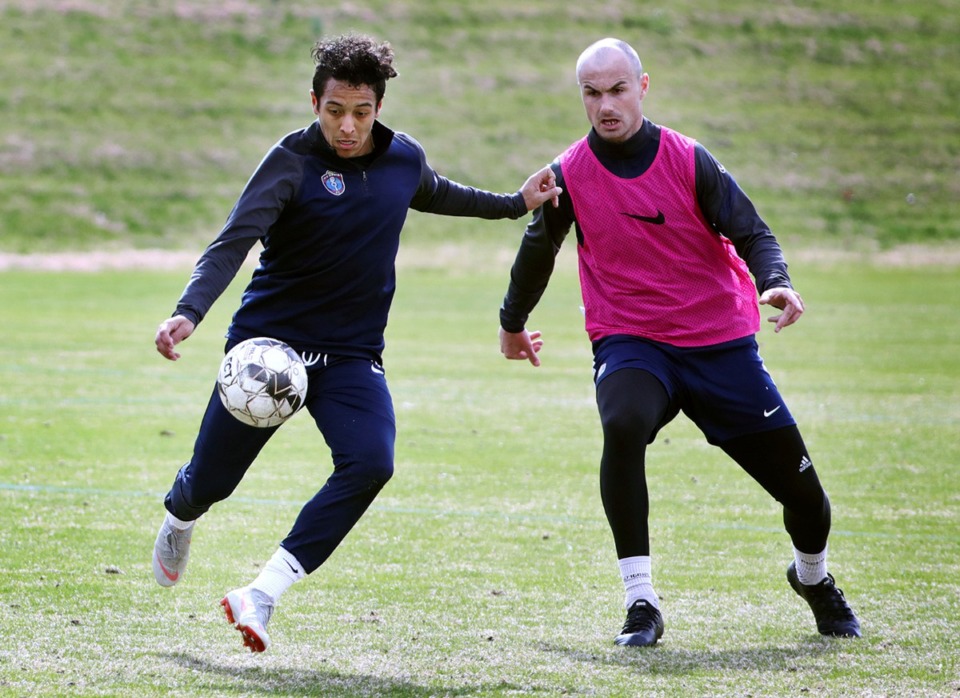 <strong>Memphis 901 FC's Raul Gonzalez (left) tries to dribble around a teammate during a Jan. 29, 2020 practice at Mike Rose Soccer Complex.</strong>&nbsp;<strong>Gonzalez will be back for 2021.&nbsp;</strong>(Patrick Lantrip/Daily Memphian file)