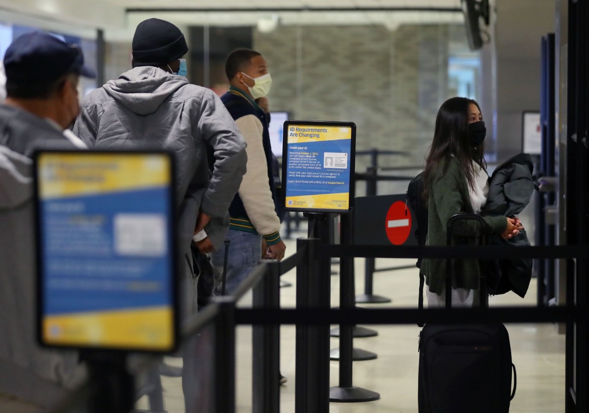 <strong>Passengers wait to scan their IDs at the TSA checkpoint at Memphis International Airport Dec. 2, 2020.</strong> (Patrick Lantrip/Daily Memphian)