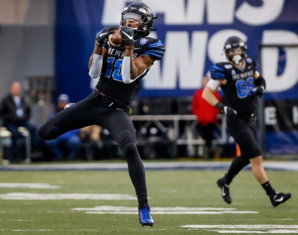 <strong>Memphis receiver Damonte Coxie makes a first-down catch against the&nbsp; Cincinnati defense on Nov. 29, 2019, at the Liberty Bowl Memorial Stadium.</strong>&nbsp;<strong>Days before the Tigers were supposed to face UCF on Oct. 17, the senior wide receiver opted out of the 2020 season.</strong> (Mark Weber/Daily Memphian file)