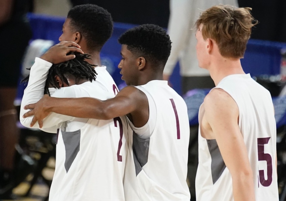 <strong>Collierville guard Terrian McNeal (1) consoles Collierville guard Jordan Coleman (2) after Collierville lost to Cane Ridge on March 19 at Murfreesboro, Tennessee.</strong> (Larry McCormack/Special to The Daily Memphian)