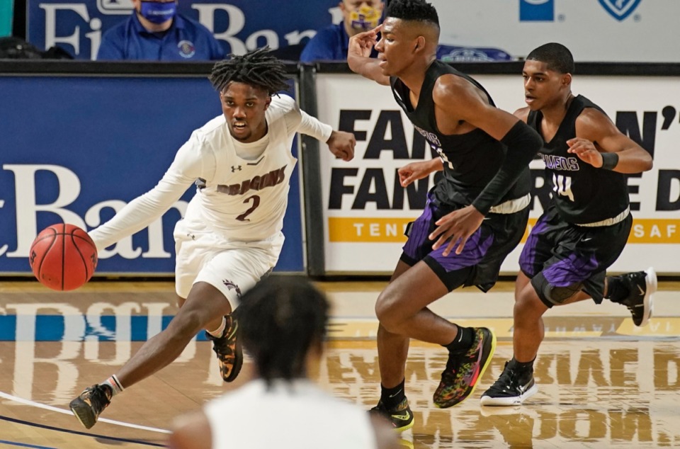 <strong>Collierville guard Jordan Coleman (2) drives around the Cane Ridge defense at the Division I Class AAA semifinal game during the TSSAA boys basketball state tournament at Middle Tennessee State University on Friday March 19, 2021, in Murfreesboro, Tennessee.</strong> (Larry McCormack/Special to The Daily Memphian)