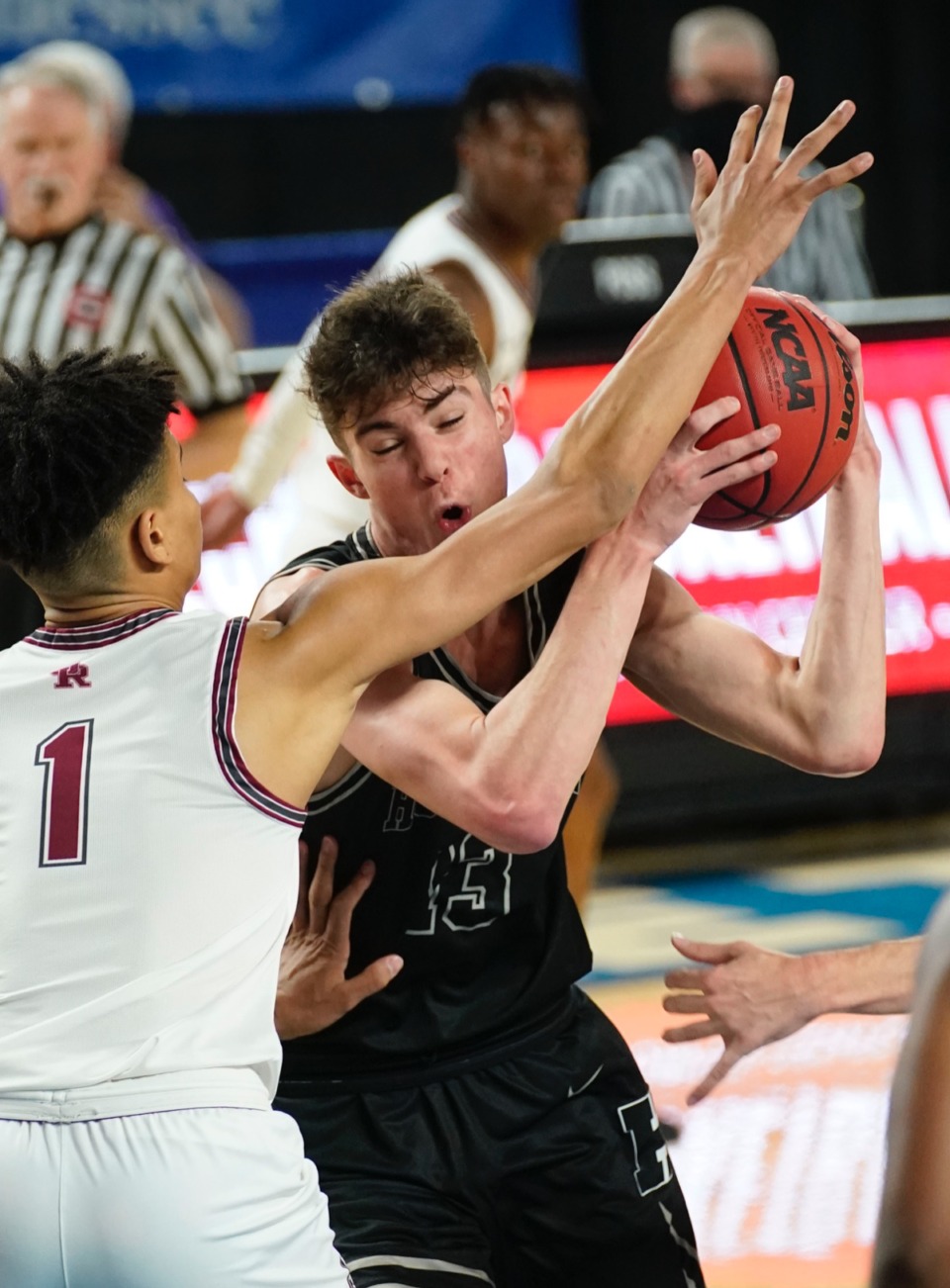 <strong>Houston forward Mason Miller (13) runs into heavy traffic under the basket&nbsp;on March 19 in Murfreesboro, Tenn.</strong> (Larry McCormack/Special to The Daily Memphian)