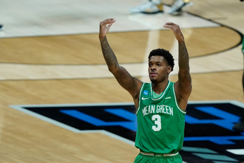 <strong>North Texas's Javion Hamlet, a former player at Whitehaven, reacts to fans during the first half of a first-round game against Purdue in the NCAA men's college basketball tournament at Lucas Oil Stadium, Friday, March 19, 2021, in Indianapolis.</strong> (AP Photo/Darron Cummings)