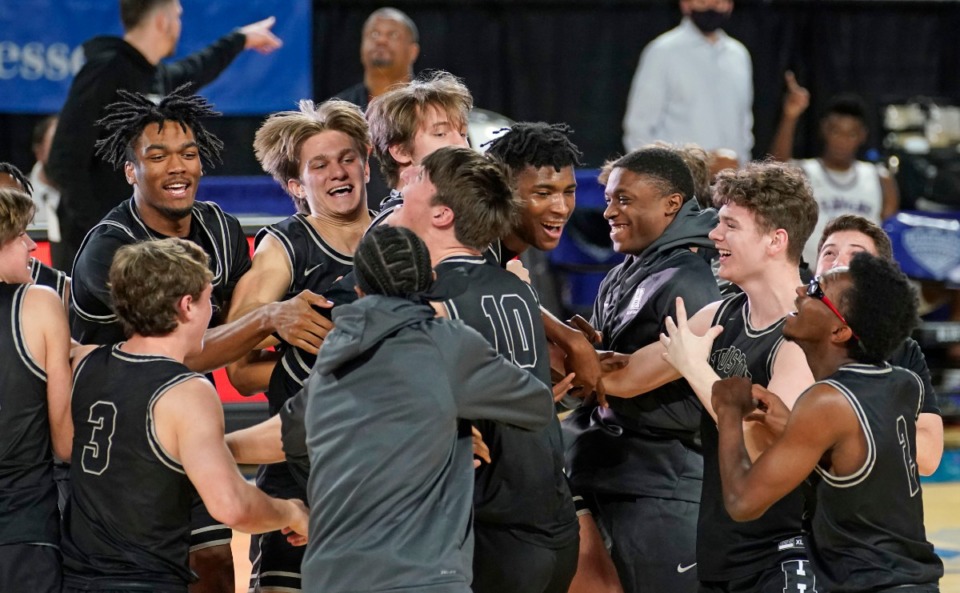 <strong>Houston players celebrate their 62-43 win over Cane Ridge Saturday, March 20, in Murfreesboro.</strong> (Larry McCormack/Special to the Daily Memphian)