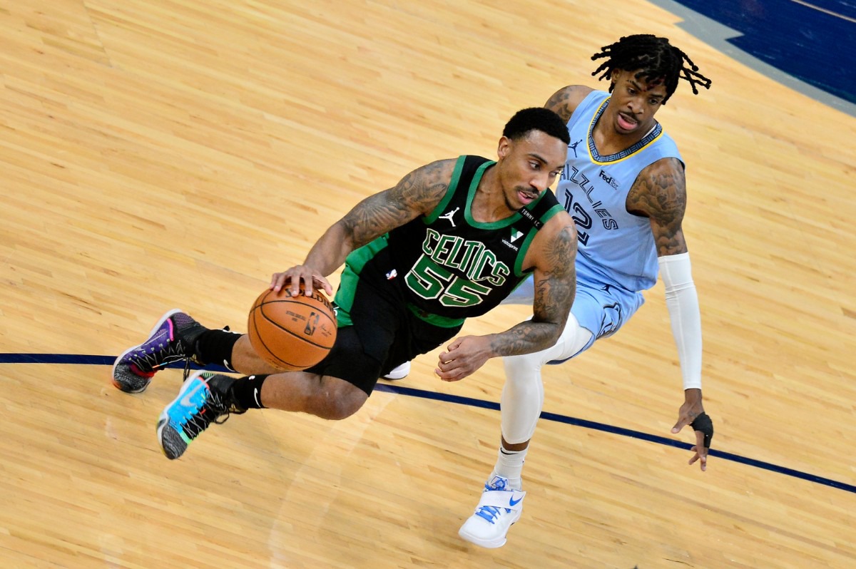 <strong>Boston Celtics guard Jeff Teague (55) drives against Memphis Grizzlies guard Ja Morant (12) on March 22 at FedExForum.</strong> (Brandon Dill/AP)