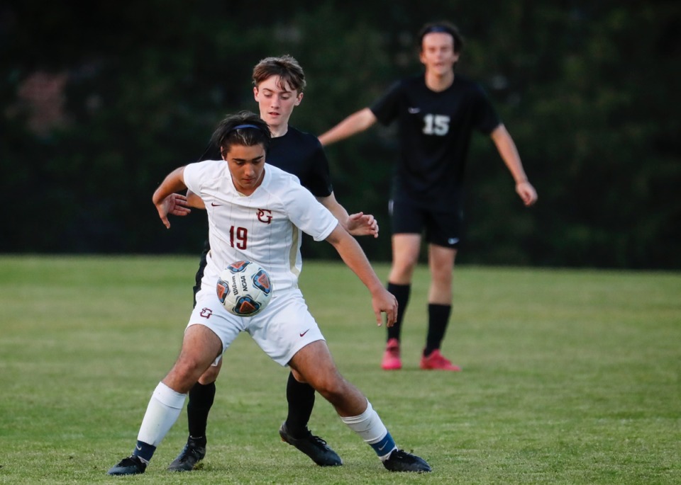 <strong>St. George&rsquo;s midfielder Diego Guerra (front) shields Houston defender Max Talley (back) on Tuesday, March 23, 2021.</strong> (Mark Weber/The Daily Memphian)