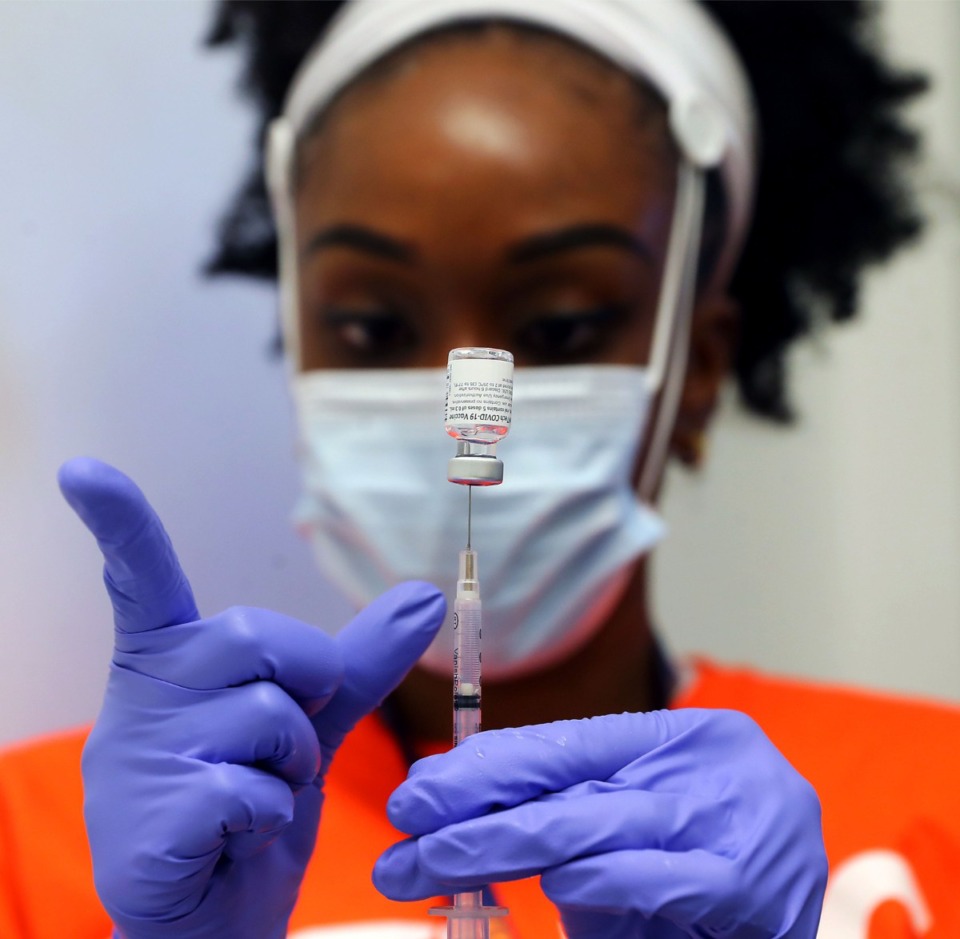 <strong>Nurse practitioner Heather Lucas prepares a dose of Pfizer's COVID-19 vaccine at the City of Memphis' Appling City Cove site March 16, 2021.</strong> (Patrick Lantrip/Daily Memphian)